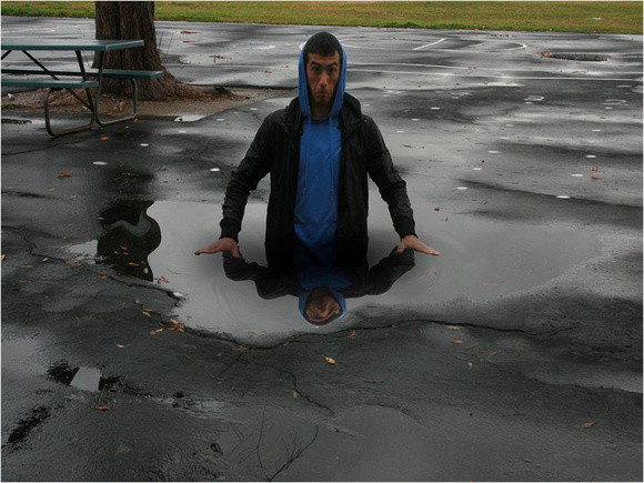 Kyle sinking into  puddle- by Ruben Ramirez Winter, 2008